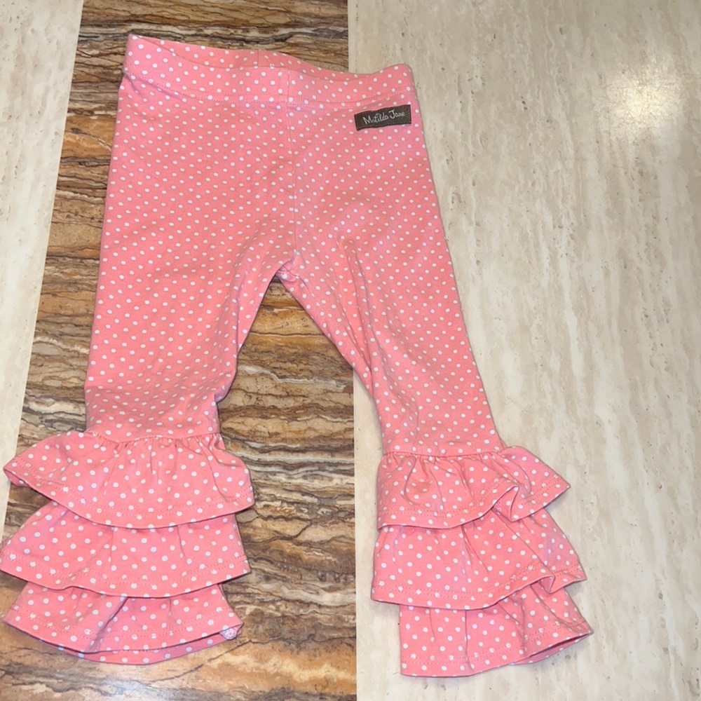 Coral-ish color with white polka dots❤️